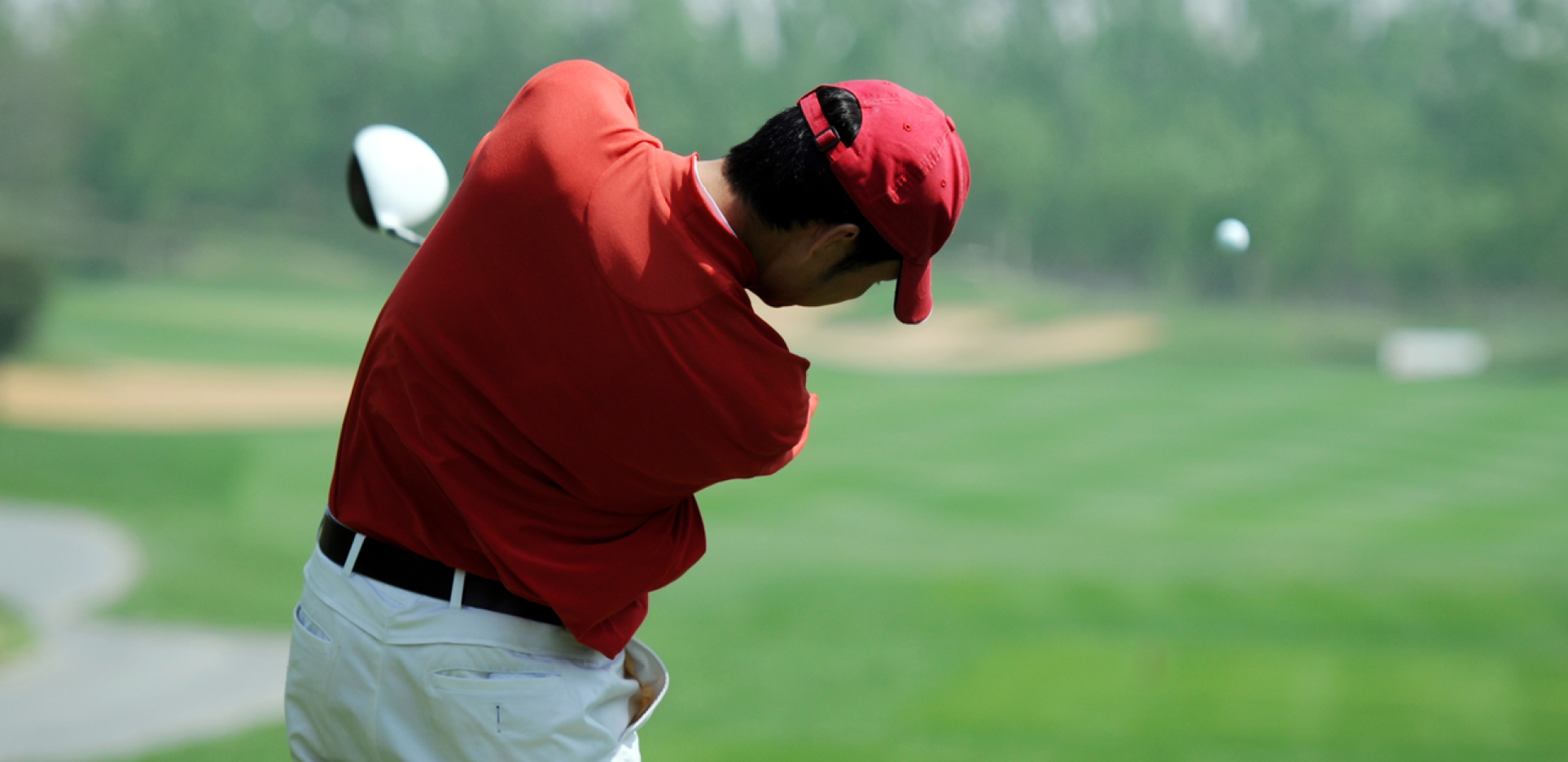 Golfer taking a swing